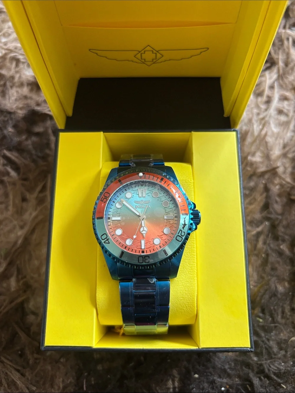 Invicta blue and orange stainless steel diver watch